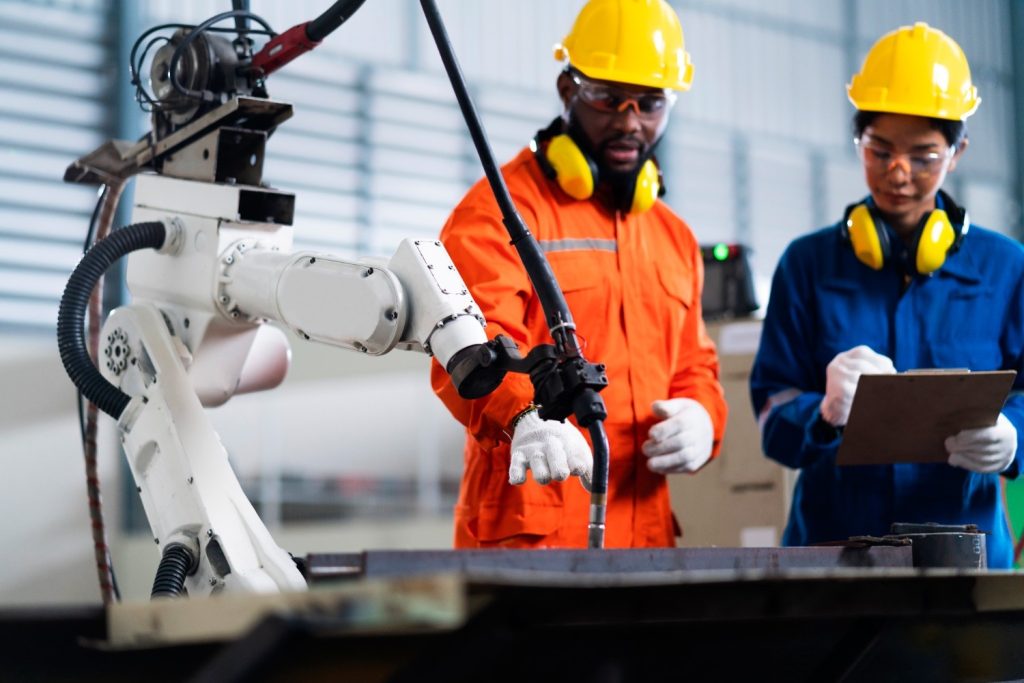 engineer-cooperation-male-female-technician-maintenance-control-relay-robot-arm-system-welding-with-tablet-laptop-control-quality-operate-process-work-heavy-industry-40-manufacturing-factory 1 - Loopp The Fastest Way to Hire Vetted AI Engineers You Can Trust